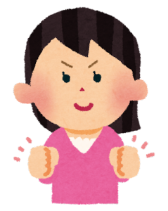 ガッツポーズする女性