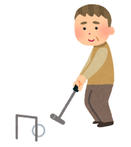 ゲートボールをする老人